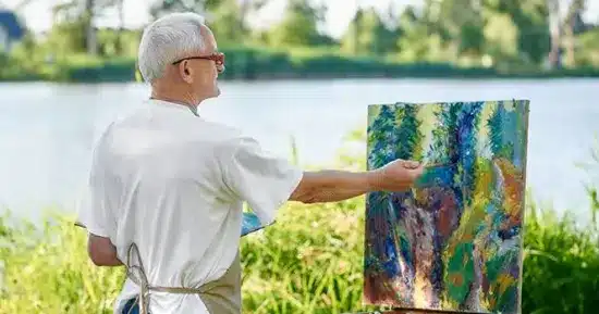 old man painting
