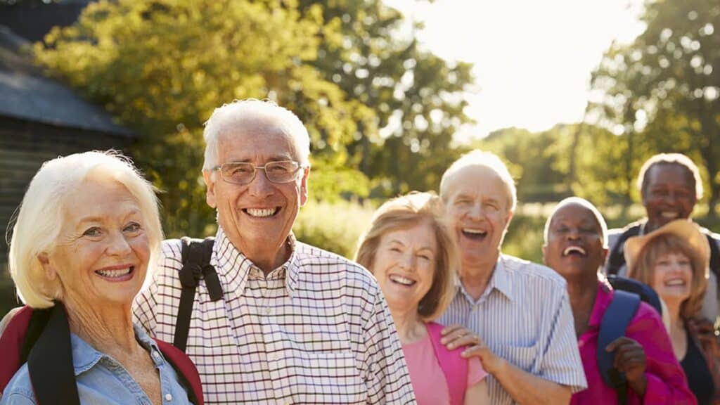 a group of older people smiling